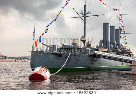 ST. PETERSBURG RUSSIA - JULY 29 2016: The legendary revolutionary cruiser Aurora at the place of eternal parking on the Petrograd embankment