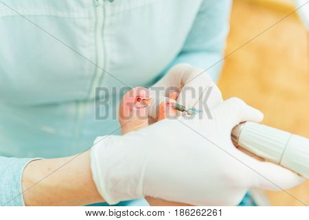 People at work. Photo of pedicure procedure in process