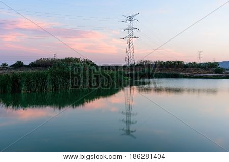 High voltage post. Highvoltage tower sky background.