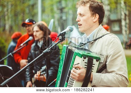 musicians sing songs on the street in Russia