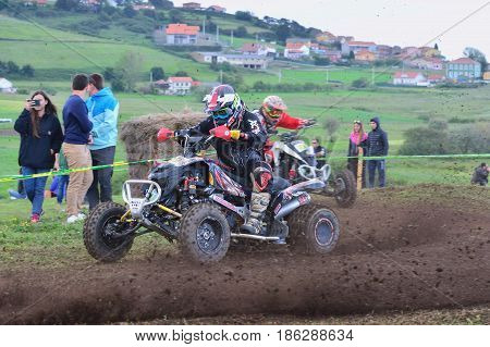 Unidentified Racers Rides A Quad Motorbike.