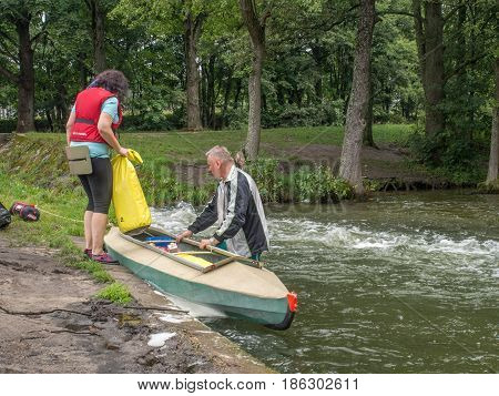 River Wda Poland - August 22 2016: Kayakers during canoeing excursion on the folding kayak