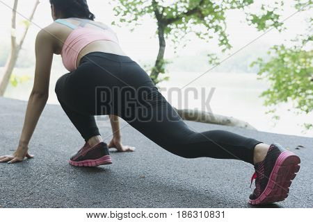 Sportswoman Athletic On Starting Point And Ready For Competition. Healthy Young Asian Athlete Woman