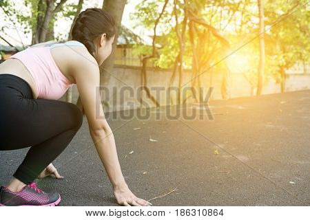 Sportswoman Athletic On Starting Point And Ready For Competition. Healthy Young Asian Athlete Woman