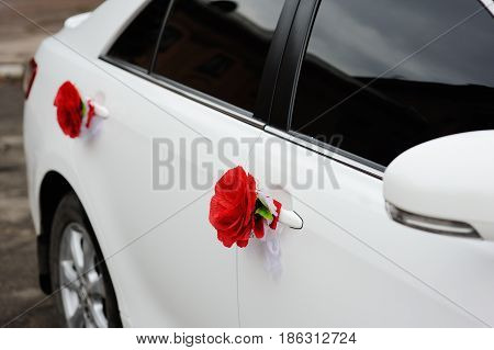 Beautiful decorations for a wedding car. Wedding organization