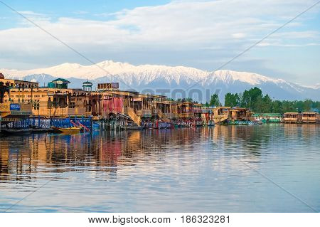 Srinagar India - April 25 2017 : Lifestyle in Dal lake People living in 'House boat' and using small boat 'Shikara' for transportation