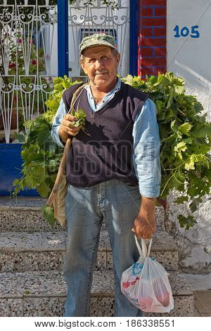 Amorgos Island Greece - October 2015: Greek man posing.The people in Greece are affraid how the Greek debt crisis has his impact on there lives and work