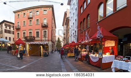 Christmas Market With Huts Lit And Decorated
