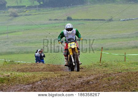 Unidentified Racer Rides A Classic Motorcycle.