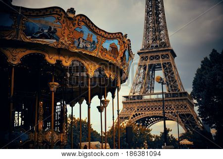PARIS, FRANCE - MAY 13: Carousel and Eiffel Tower on May 13, 2015 in Paris. With the population of 2M, Paris is the capital and most-populous city of France