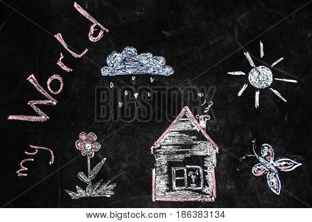 Chalk Drawing Of House And Sun On A Black Background,