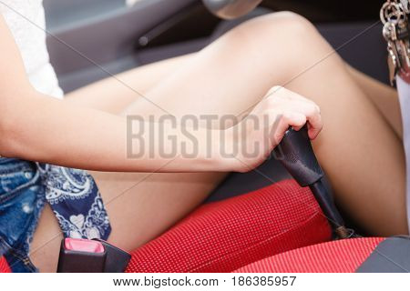 Transportation and vehicle concept. Female driver hand shifting gear manually.