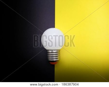 Light Bulb Simulating On and Off on Colored Paper