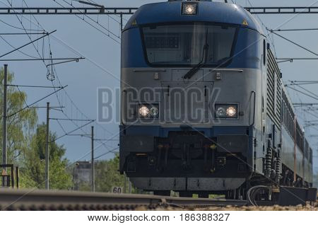 Electric engine and train near Ceske Budejovice town in south Czech republic
