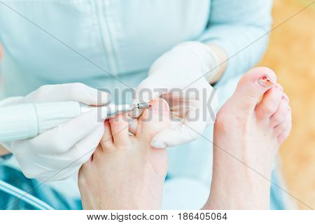People at work. Photo of pedicure procedure in process