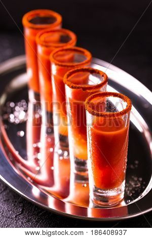 Bloody Mary Cocktail With Chili Pepper, Ice And Celery.