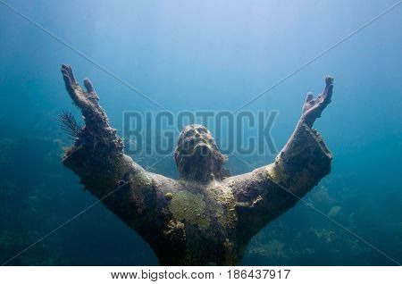 Christ of the abyss underwater image toned image