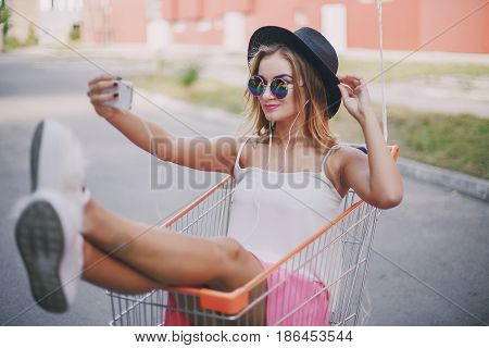 two girls walking city using communication outdoors