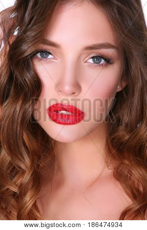 Beautiful woman skin with red lips on white background