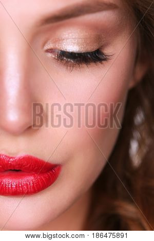Beautiful woman skin with red lips on white background