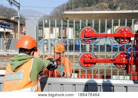Workers During The Installation Of Noise Barriers On The Railway
