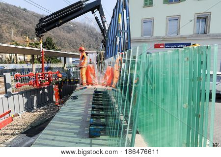 Workers During The Installation Of Noise Barriers On The Railway