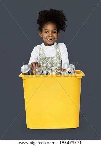 African Descent Girl holding Plastic Container