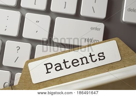 Patents written on  File Card on Background of White PC Keyboard. Archive Concept. Closeup View. Toned Blurred  Illustration. 3D Rendering.