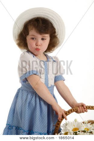 Une belle petite fille avec Bonnet.