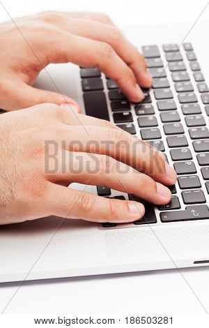 Laptop computer typing computer keyboard man close-up male