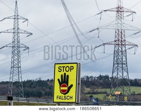 power line and stop sign