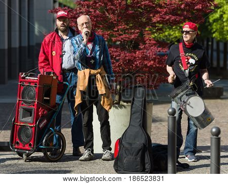 BERLIN - MAY 01 2016: Performance of street musicians. Members of trade unions workers and employees at the demonstration on the occasion of Labour day.