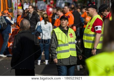 BERLIN - MAY 01 2016: Members of the security services. Members of trade unions workers and employees at the demonstration on the occasion of Labour day.