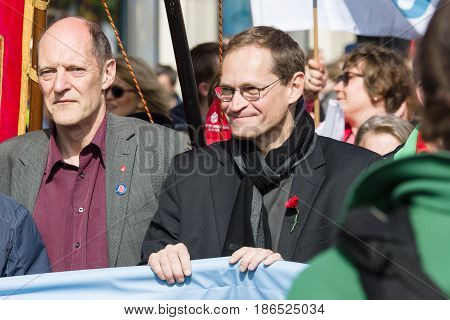 BERLIN - MAY 01 2016: Governing Mayor of Berlin Michael Mueller (center). Members of trade unions workers and employees at the demonstration on the occasion of Labour day.