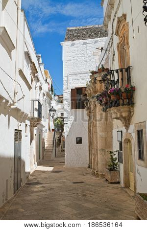 Chararacteristic alleyway of Locorotondo. Puglia. Southern Italy.
