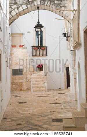 Chararacteristic alleyway of Locorotondo. Puglia. Southern Italy.