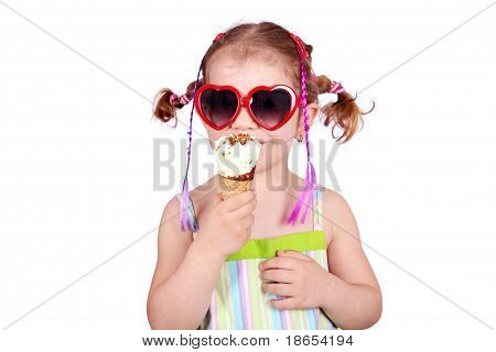 little girl with heart sunglasses and ice cream