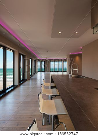 Interiors of a modern apartment, without furniture, sea view