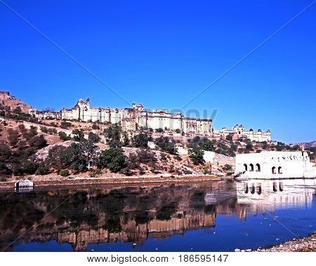 AMBER, INDIA - NOVEMBER 23, 1993 - View of the Amber Fort with a reflection in the lake Amber Rajasthan India, November 23, 1993.
