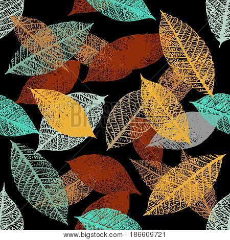 A seamless background pattern of vector skeleton leaves in teal blue and rusty brown on black, autumnal repeat print