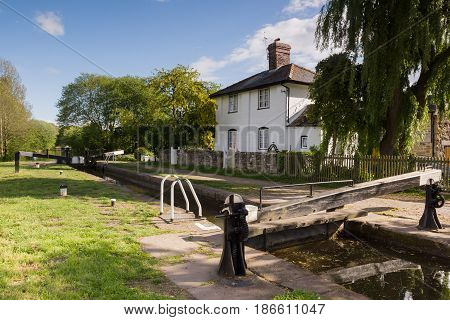 The 200 year old New Marton upper lock on the Shropshire Union canal an idyllic view on the British inland waterway network