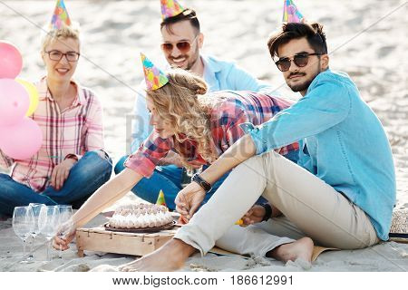 Group Of Friends Having Fun On The Beach