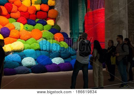 VENICE ITALY - MAY 10: Installation view of work by Sheila Hicks's Escalade Beyond Chromatic Lands at the 57th Venice Biennale on May 10 2017