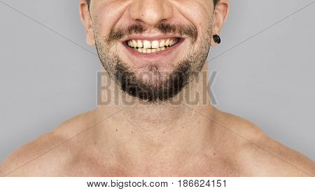 Adult man smiling studio portrait
