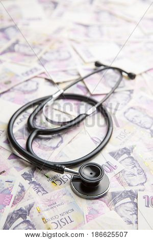 Stethoscope on money czech background