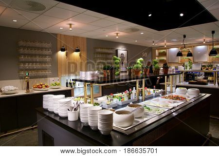 OSLO, NORWAY - JAN 21st, 2017: airport business class lounge interior of SAS, buffet and eating area in a frequent flyer lounge for SAS Gold customers, food and drinks.