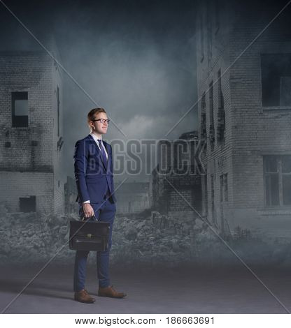 Businessman standing on apocalyptic background. Crisis, default, setback concept.