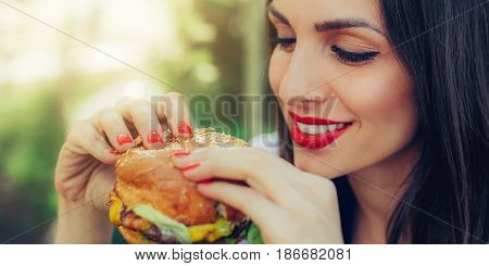 Happy Young Woman Eat Tasty Fast Food Burger