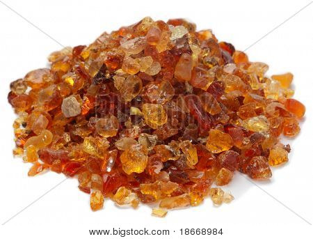 pile of Gum Arabic over white