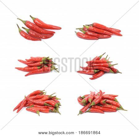 Pile of red italian peppers isolated over the white background, set of six different foreshortenings